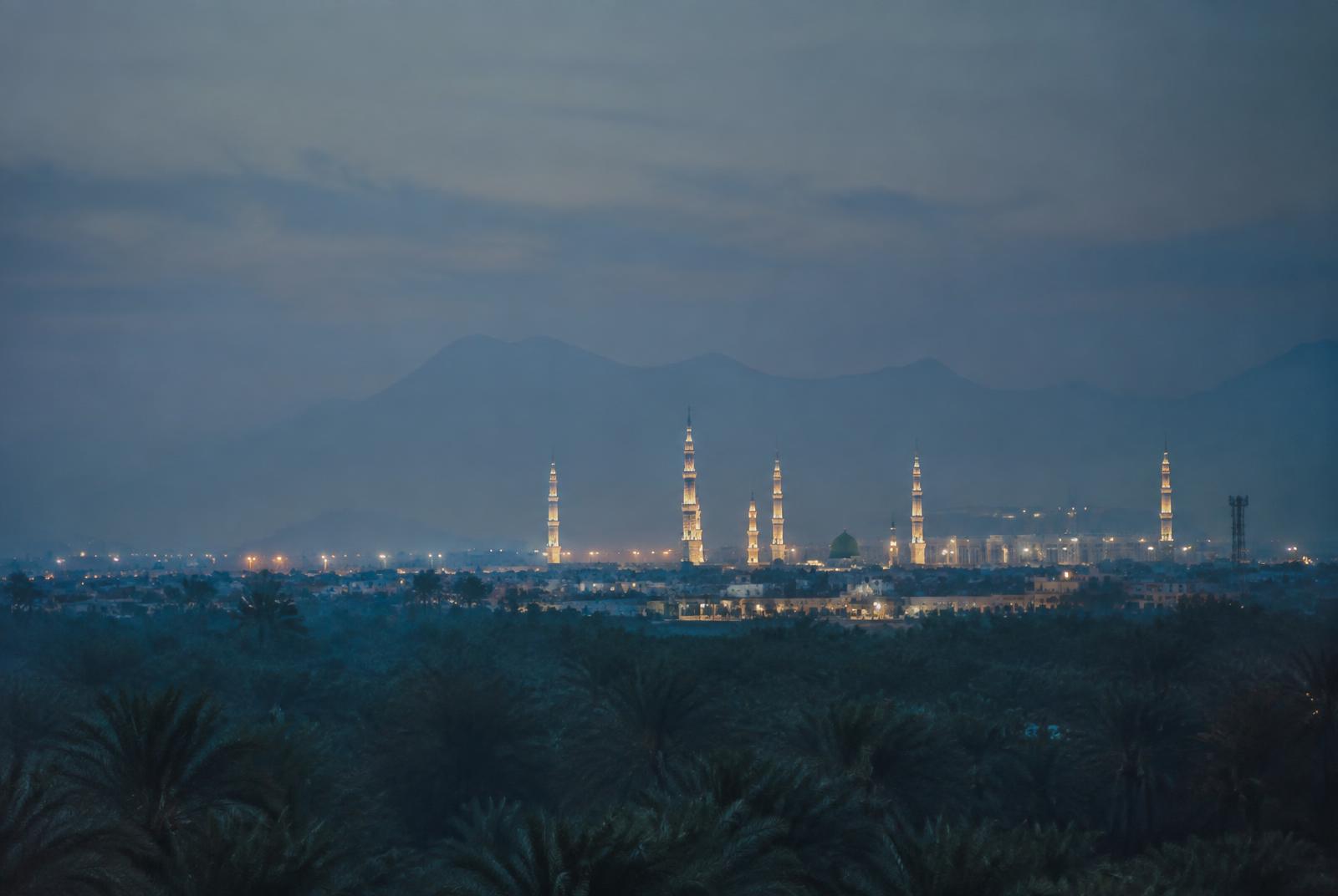 Madinah at blue hour beyond the palm groves